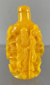 Chinese High Relief Yellow Figural Snuff Bottle