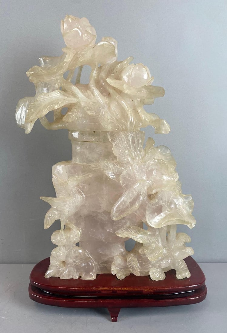 Chinese Carved Quartz Floral Lidded Jar with Wood Stand: Some natural cracks. Measures 16 x 9 1/2 x 4 1/4 inches with stand