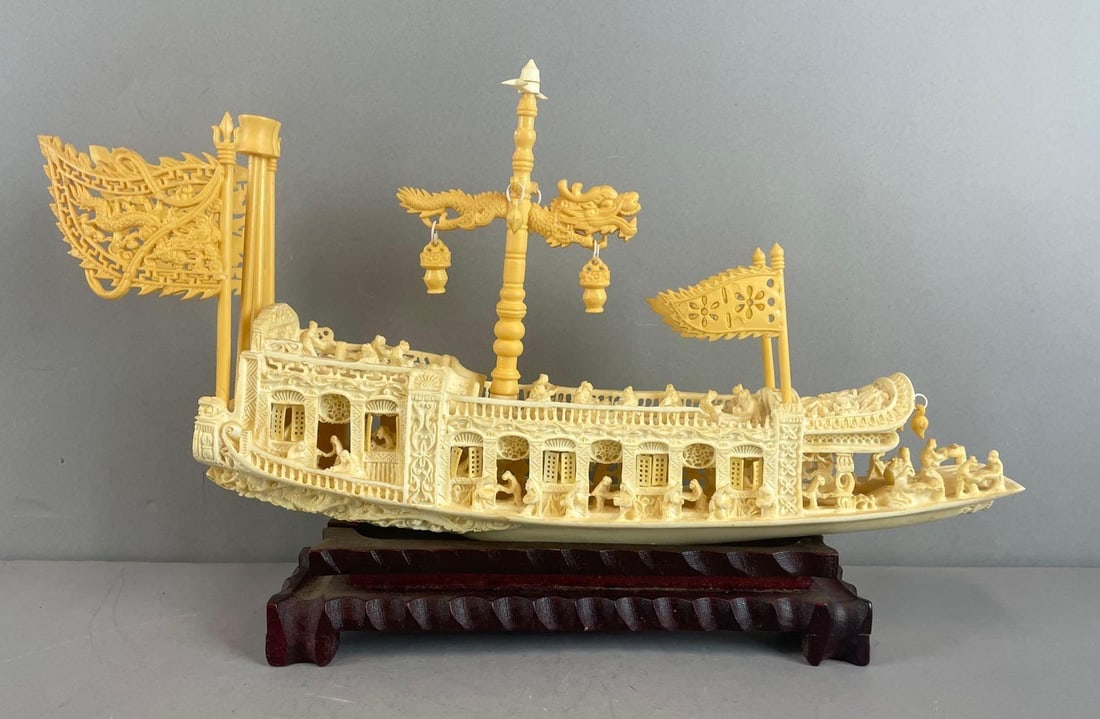 Chinese Resin Boat on Wood Stand: One figure broke on front of boat, measures 10 1/2 x 17 x 3 inches
