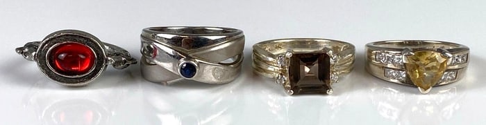 Group of 4 Sterling Silver and Costume Jewelry Rings