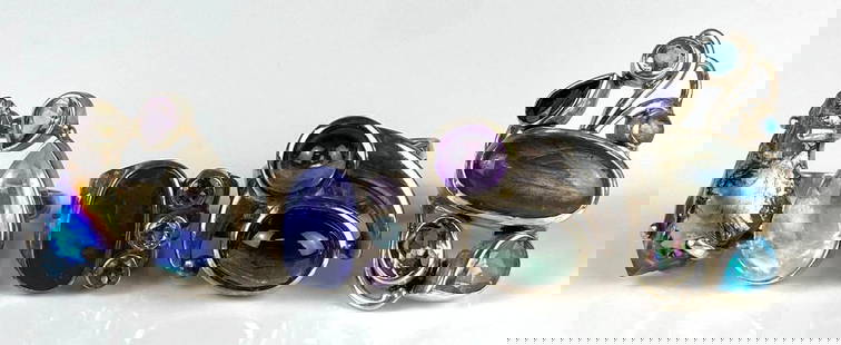 Group of 4 Multi-Gemstone Costume Jewelry Rings: Sizes range from 7 - 8.