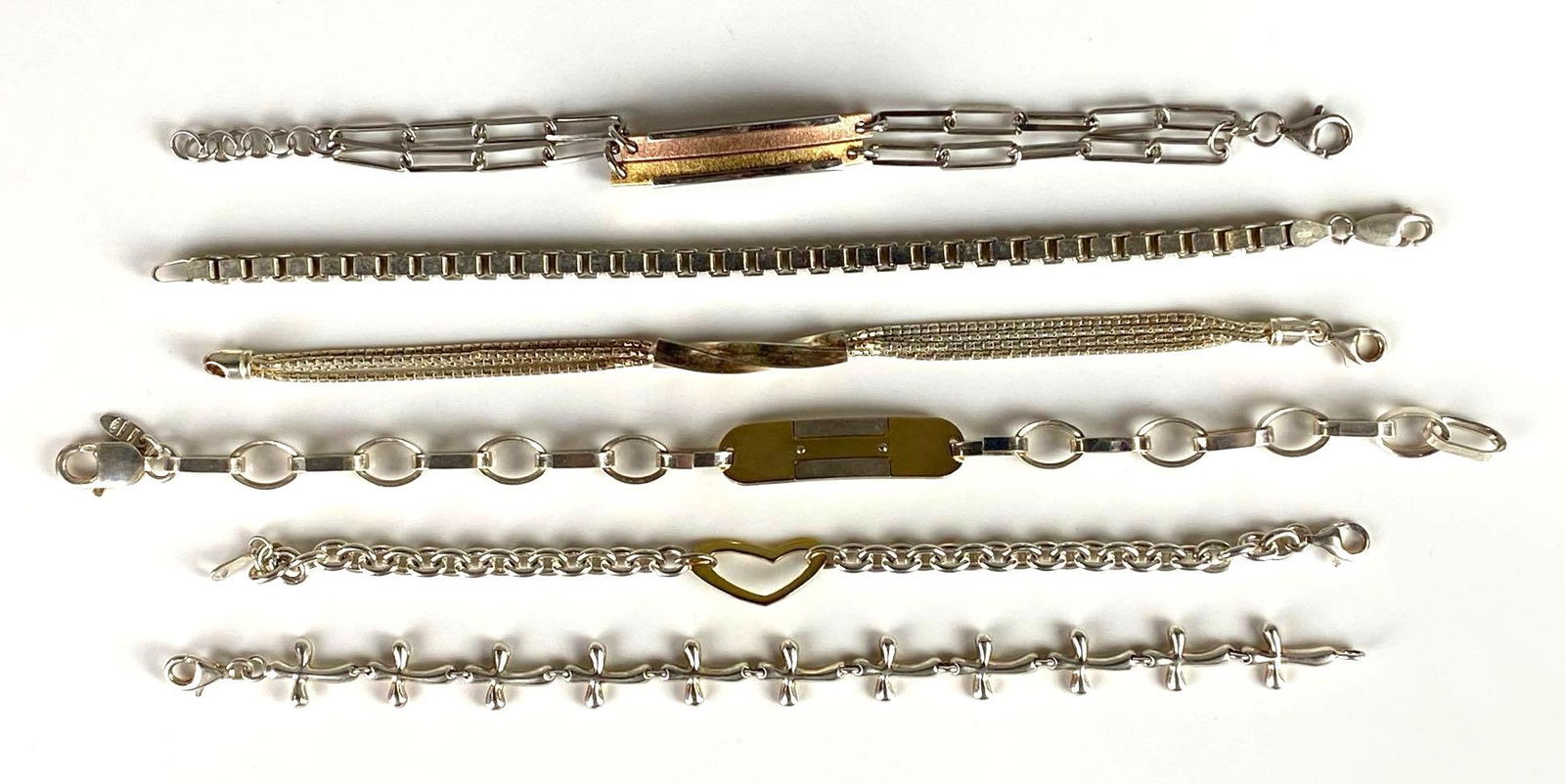 Group of 6 Sterling Silver Link Bracelets: Longest measures 8 3/4 inches long.