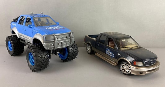 Group of 2 Ford Toy Trucks