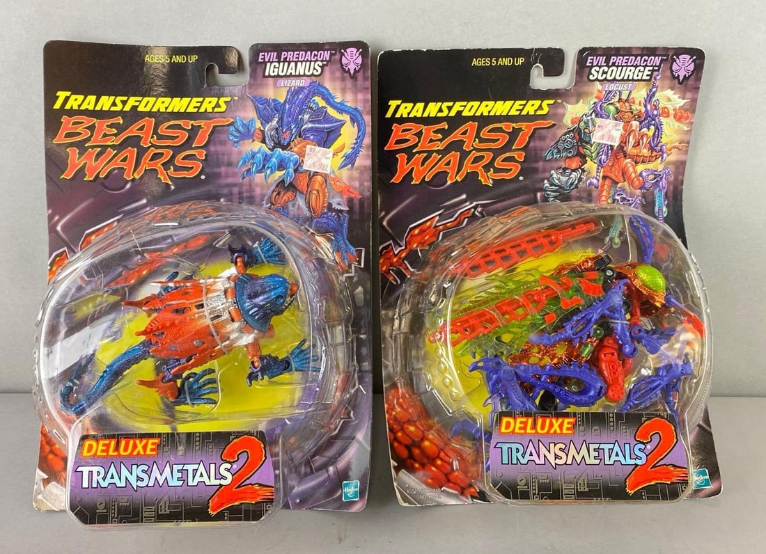 Groupnof 2 Hasbro Deluxe Transmetals 2 Action Figures: In original packaging. Includes Evil Predacon Iguanus Lizard and Evil Predacon Scourge Locust. Cardboard is curling some. Largest measures 12 x 8 1/2 x 3 inches.