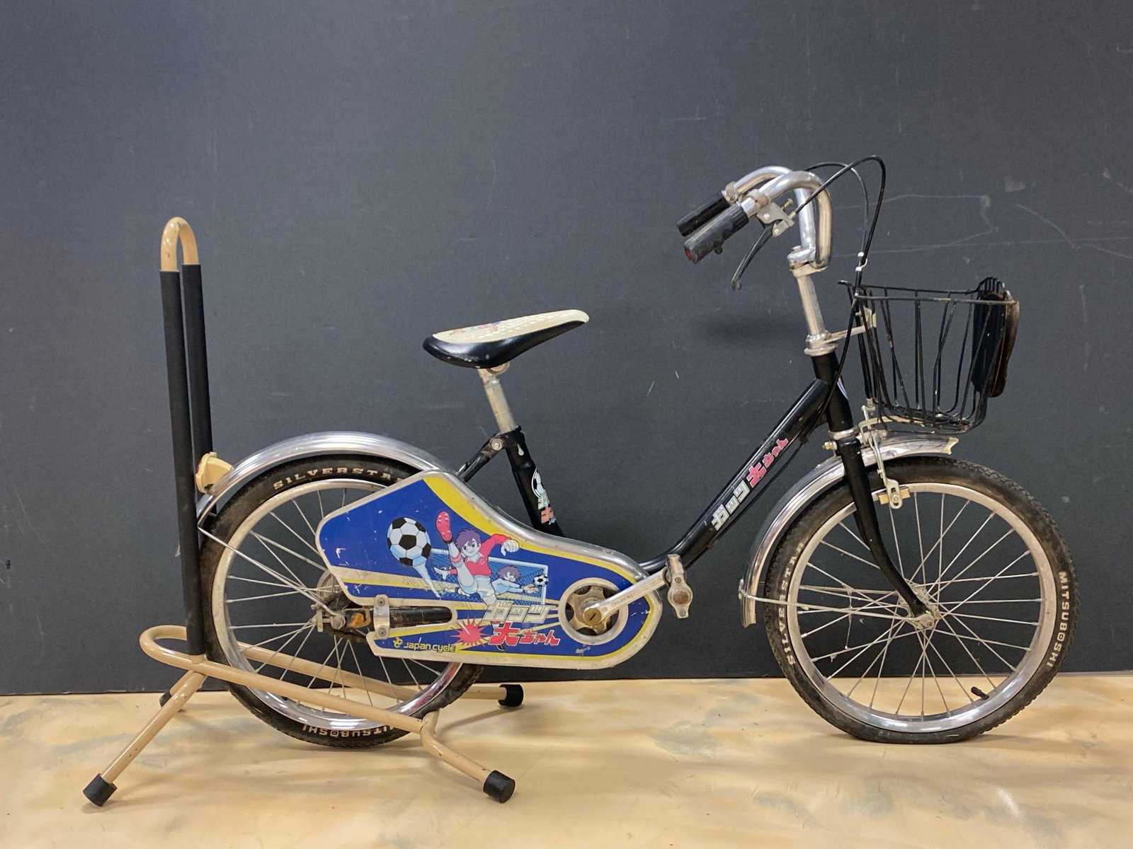 Vintage Japan Cycle Black 14 Inch Bike: NO IN HOUSE SHIPPING AVAILABLE, THIRD PARTY SHIPPING RECOMMENDED, bike stand not included, Features Mitsubishi Silverstar tires, total measurement of 18 x 32 x 47 inches