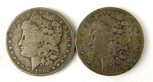 Group of 2 US Morgan Silver Dollars
