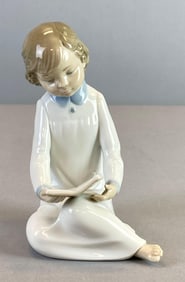 Nao Boy Reading Porcelain Figurine
