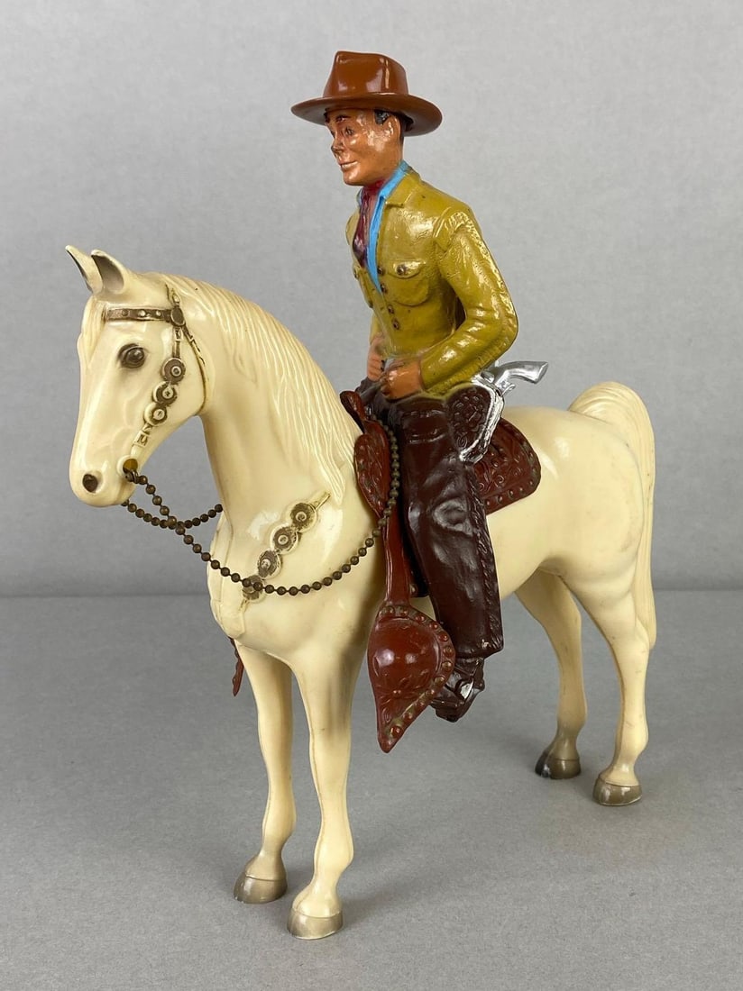 Hartland Molded Cowboy and Horse Figures: Molded plastic, With saddle, hat, and gun, Horse measures 7 1/4 x 8 1/4 x 2 inches.
