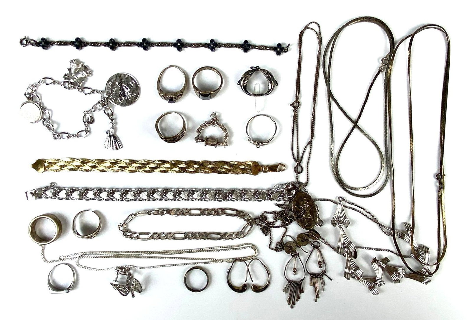 Group of Sterling Silver Jewelry: Includes necklaces, bracelets, earrings, and more, Longest necklace measures 28 inches long.
