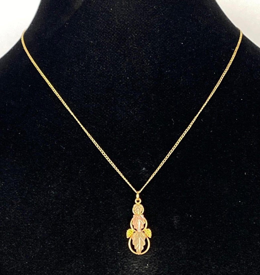 10K Black Hills Gold Necklace With Leaf Pendant: Total weight 2.1g, Landstrom, Necklace measures 18 inches long.