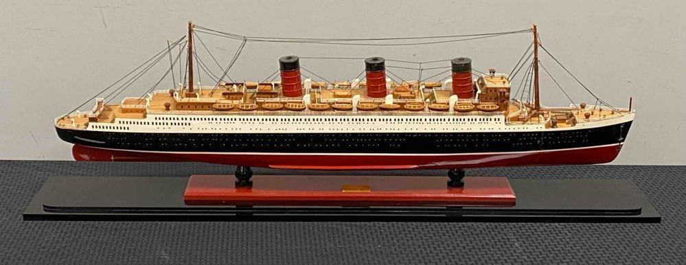Large RMS Queen Mary Ocean Liner Wood Model: THIRD PARTY SHIPPING RECOMMENDED, One supporting column detached from vessel, includes plastic shell that fits onto black base, vessel measures 40 x 5 x 12 1/2 inches