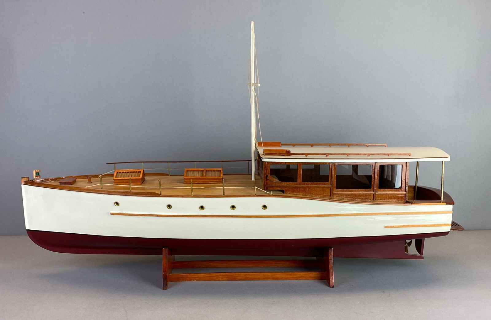 1929 Lake Union Dreamboat Wood Model: Features felt lined fitted display stand, missing flag that erects from back of cabin, Left plastic for cabin windows detached from frame, measures 19 1/2 x 34 x 9 1/4 inches