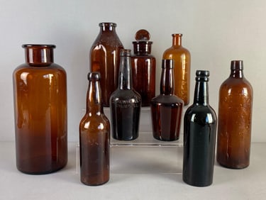 Group of 9 Vintage Brown Glass Bottles