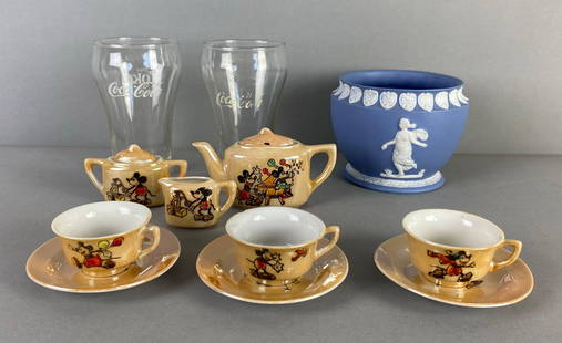 Group of Assorted Glass and Porcelain Items: Includes 2 Coca-Cola glasses, Blue and White Wedgewood Jar and Japanese Mickey Mouse Tea Set, Wedgewood jar measures 3 1/2 x 4 3/4 inches