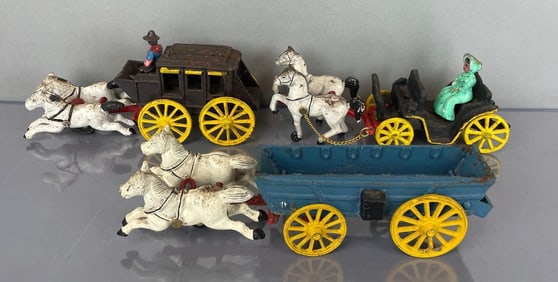 Group of Reproduction Cast Iron Horse-Drawn Carriages