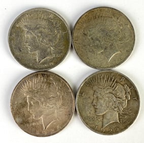 Group of 4 1920s US Silver Peace Dollar Coins