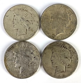 Group of 4 1922-1923 US Silver Peace Dollar Coins
