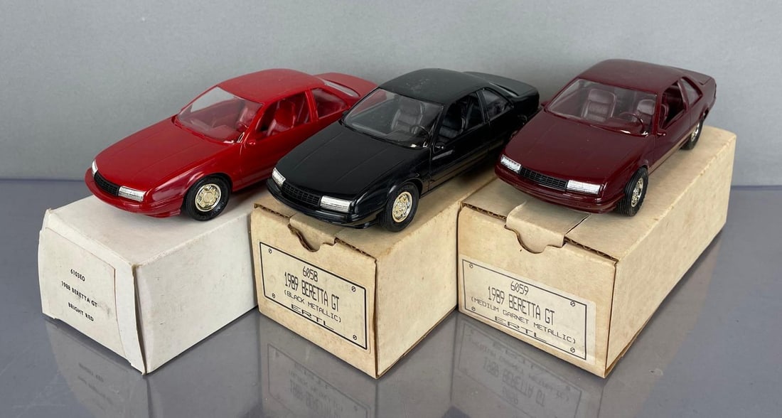 Group of Ertl Late 1980s Chevy Beretta GT Dealership Promo Cars: Includes red 88, black and medium garnet 89s, original boxes
