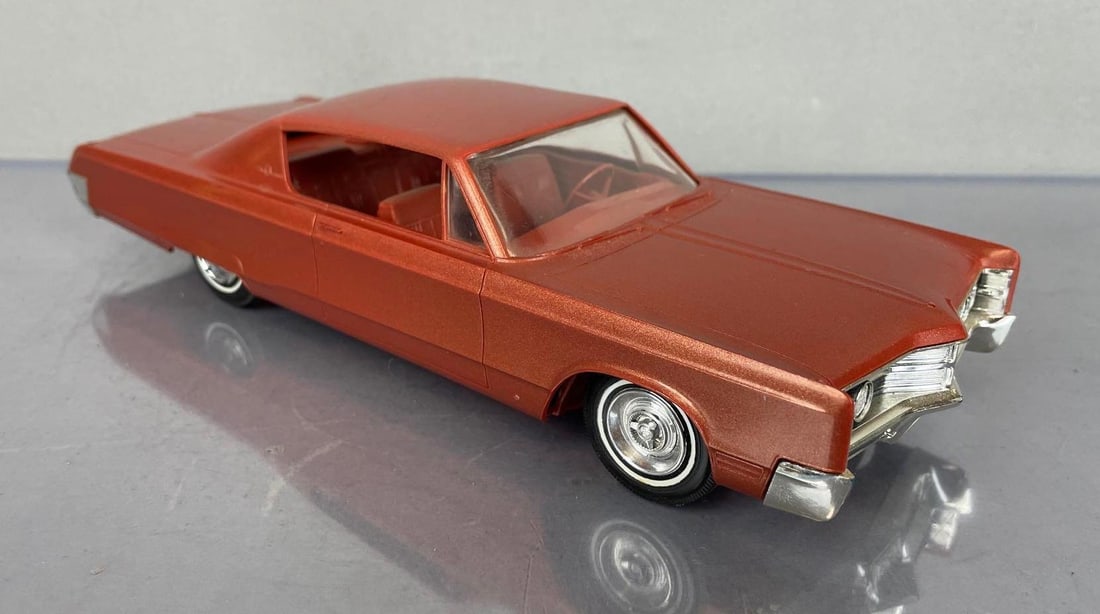 1967 Chrysler 300 Dealership Promo Car: Metallic burnt orange, orange interior, some scratches, coaster