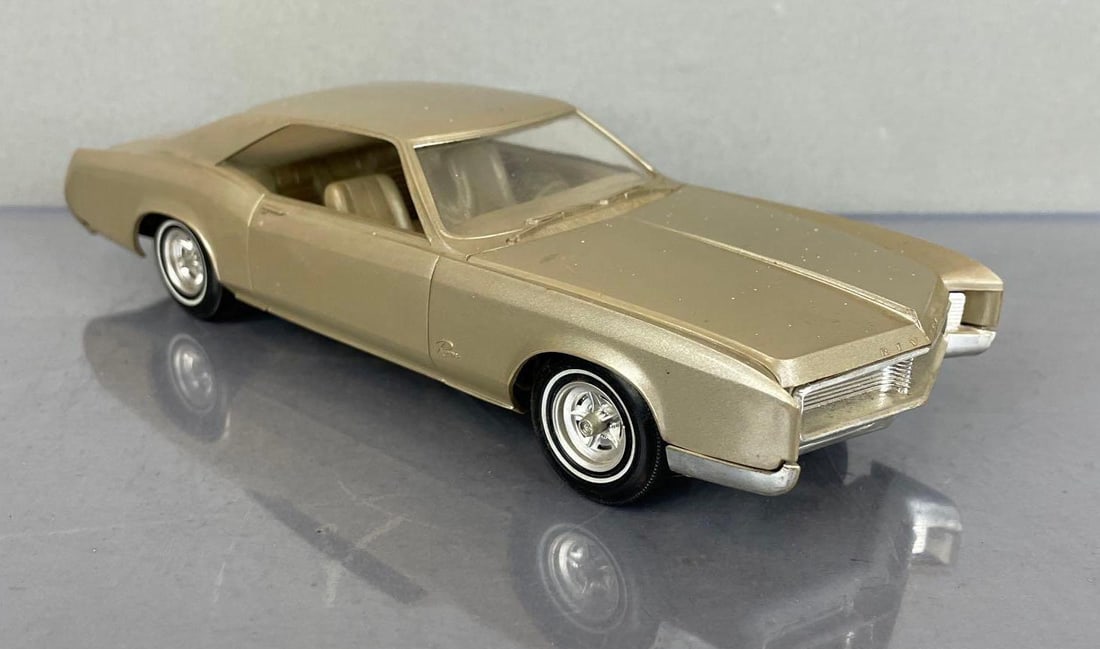 1966 Buick Riviera Dealership Promo Car: Gold, matching interior, scuffs, possible paint splatter, coaster