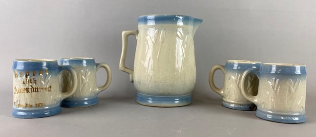 Blue and White Stoneware Cattail Pitcher and Mugs