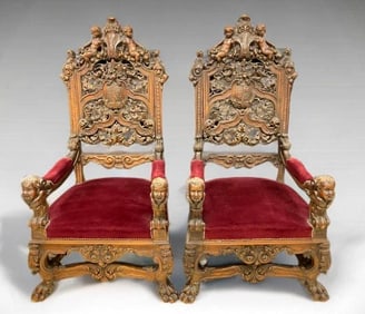 Monumental Pair of Carved Renaissance Revival Thrones with Cherub and Lion Detail