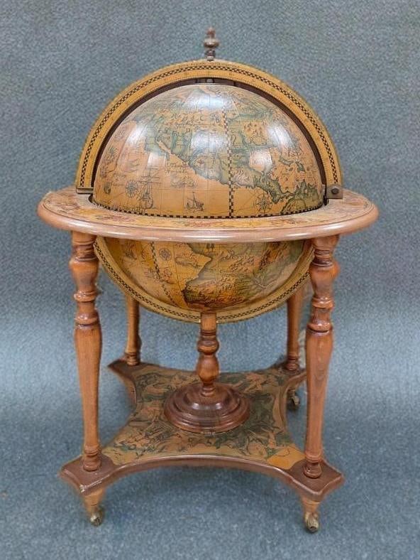 Vintage Italian Style Globe Bar Cart with Zodiac Motif: No in-house shipping available, 3rd party shipper recommended. Zodiac calendar on rim, Italian titles, wood legs with casters. Measures 39 x 30 inches