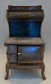 Antique The Globe Pioneer Cast Iron Stove