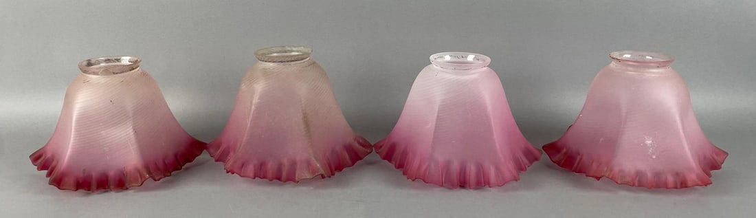 Group of Antique Cranberry Frosted Swirl Ruffle Glass Lamp Shades: Some chips and flea bites on fitters, 4 1/4 x 6 1/2 inches, 2 1/4 inch fitters