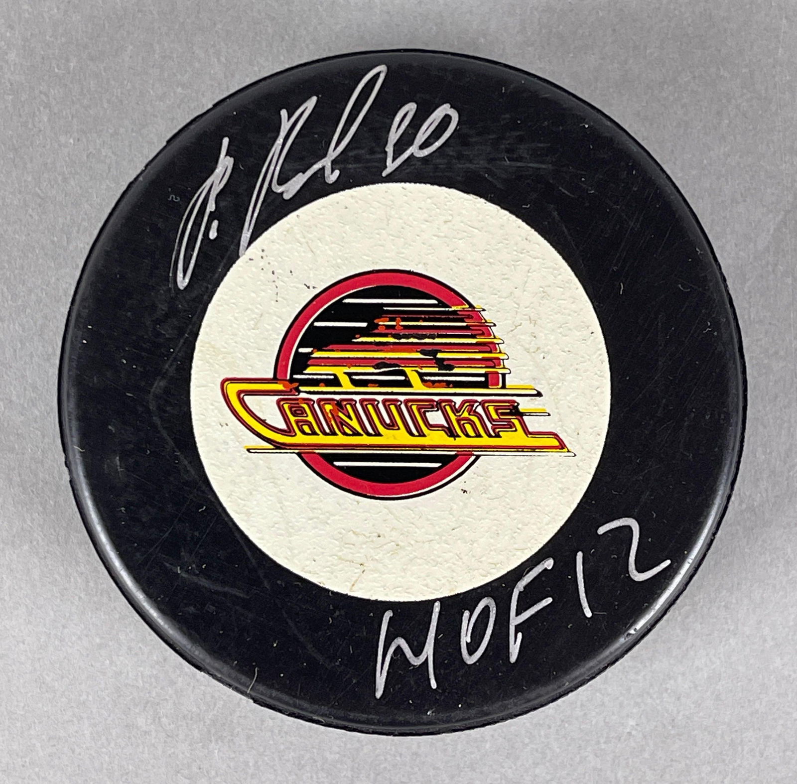 Pavel Bure Signed Official NHL Canucks Puck with Inscription and COA: Autographed Pavel Bure HOF12, with Sportsauthentix COA, Case included