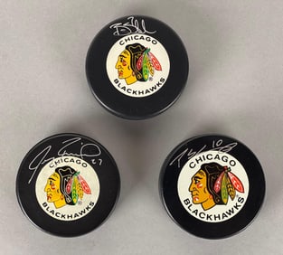 Jeremy Roenick, Patrick Sharp, and Brent Seabrook Chicago Blackhawks Signed Pucks
