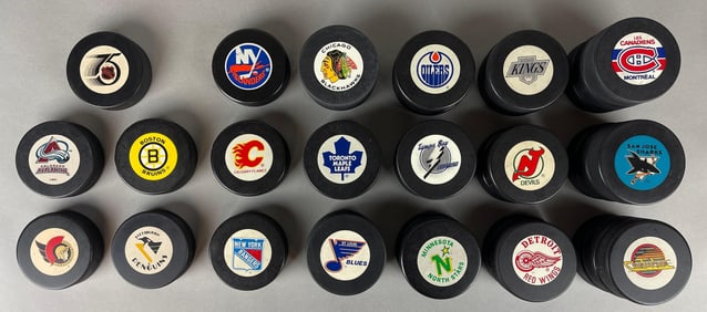 35 - Unsigned NHL Hockey Pucks