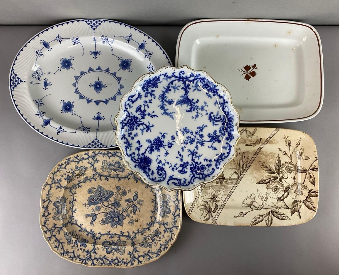 Group of 5 Antique Porcelain Platters: 3 platters have crazing and one has a small chip. Includes Hanley, Royal Ironstone China, Cauldon Largest measures 1 3/4 x 18 x 14 1/4 inches.