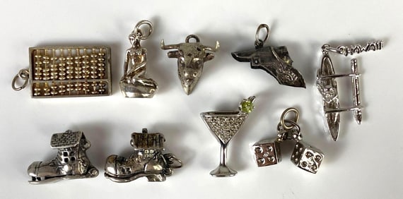 Group of 9 Sterling Silver Charms
