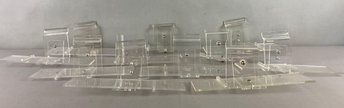 Group of 11 Plastic Slat Wall Shoe Displays