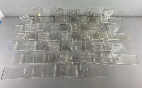 Group of 26 Plastic Slat Wall Shoe Displays