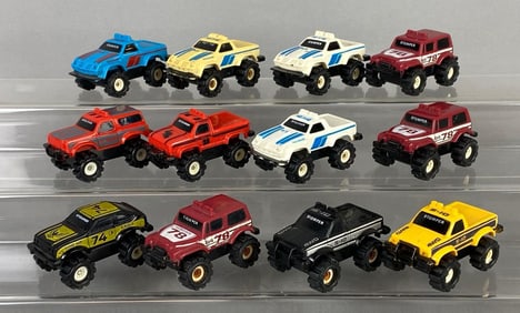 Group of 12 Schaper Co. Stomper Plastic Vehicles