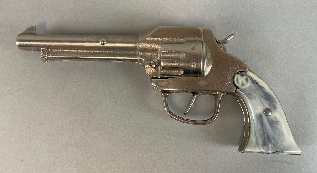 Vintage Kilgore Ranger Cap Gun: Bakelite grip, working condition, measures 8 1/2 x 4 x 1 3/4 inches
