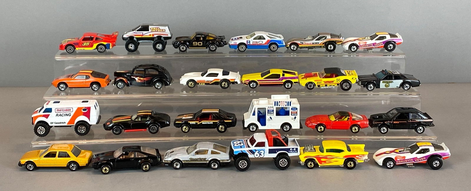 Group of 48 1970s - 1990s Matchbox and Hot Wheels Cars: Die-Cast, Includes race cars, hot rods, service vehicles and more, includes 48 car carrying case