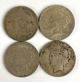 Group of 4 Peace Silver Dollars