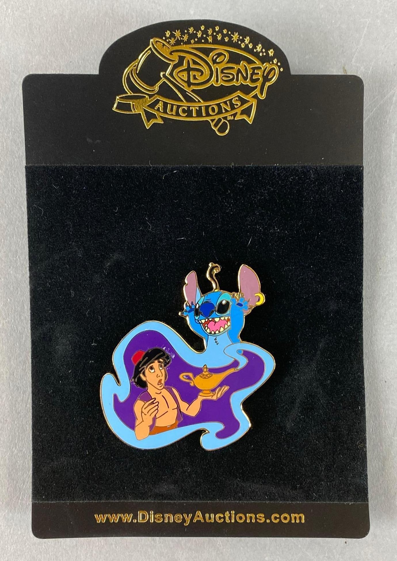 Disney Auction Stitch as Genie Enamel Pin: Features Stitch and Aladdin. Pin measures 2 1/4 x 2 inches.