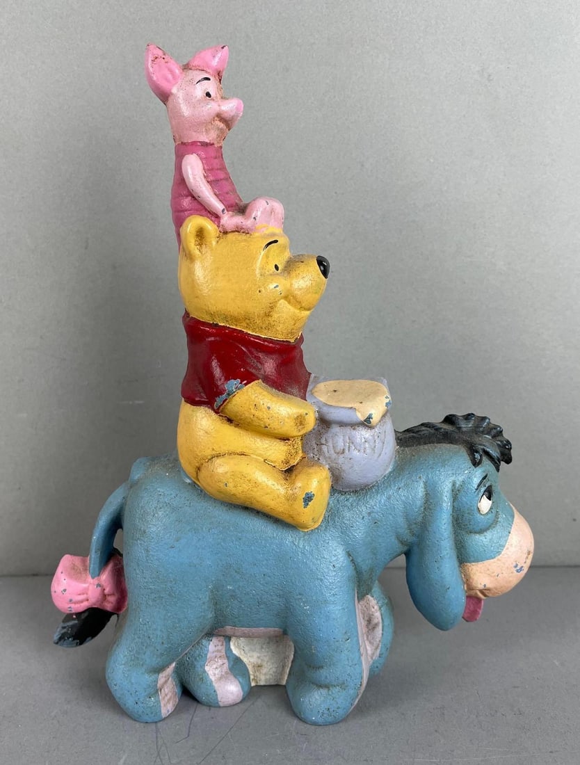 Disney Winnie the Pooh Cast Iron Doorstop: Measures 8 1/2 x 7 x 3 1/3 inches