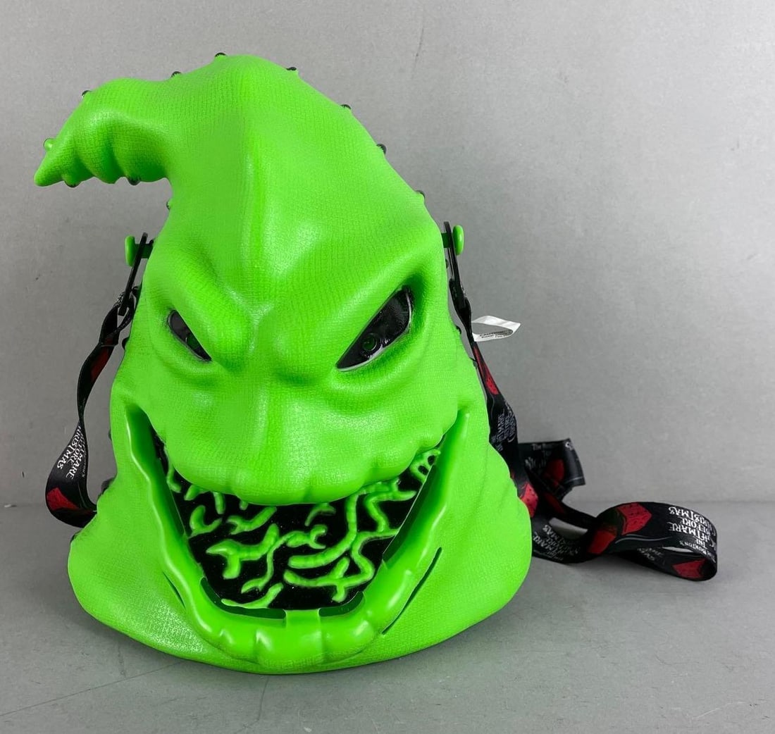 Disney Parks Nightmare Before Christmas Oogie Boogie Light-Up Popcorn Bucket: Working condition, measures 8 1/4 x 7 1/2 x 7 1/2 inches