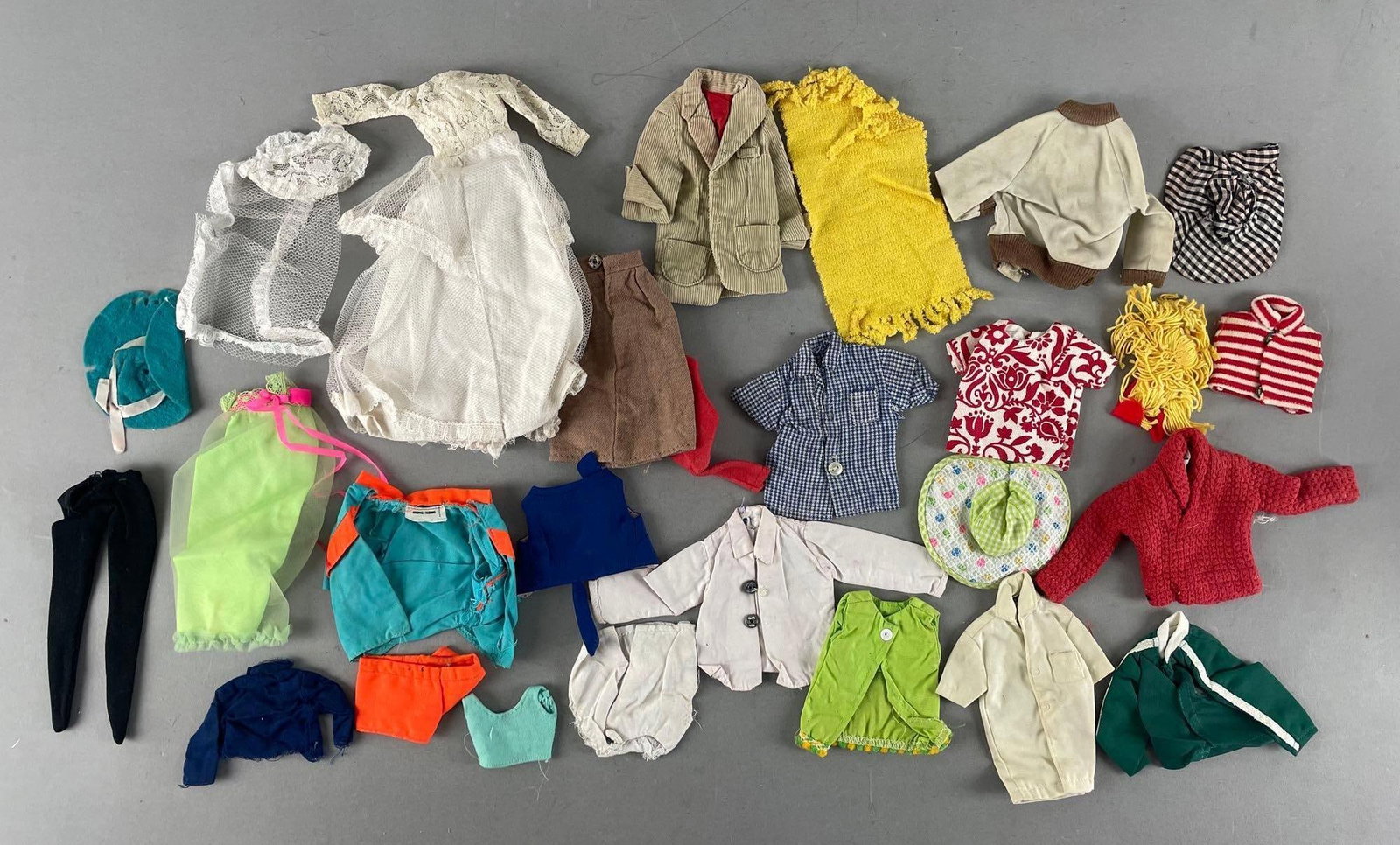 Group of Vintage Barbie and Ken Fashion Doll Clothing: Includes wedding gown, hats, shirts