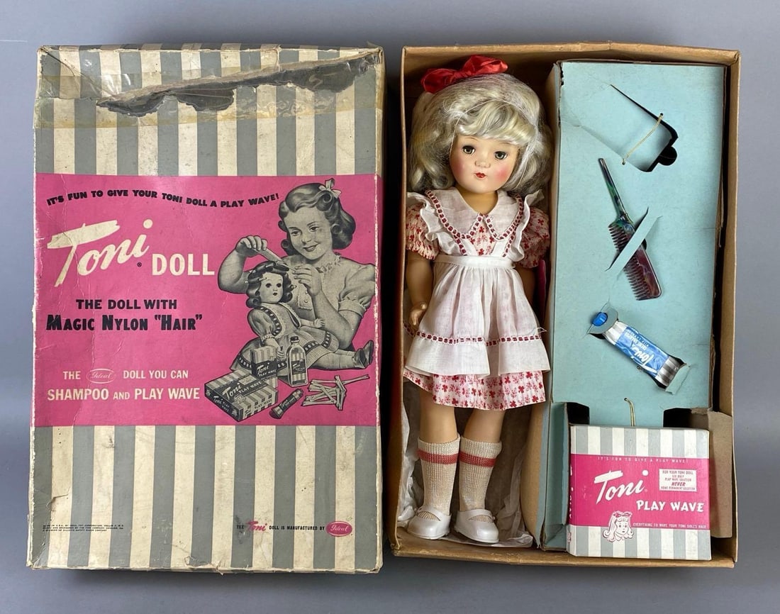 Vintage Ideal Toni P-92 Blonde Doll with Original Box: Green sleepy eyes, With Play Wave Kit, Some large tears in box, Some tears taped, Box measures 20 x 13 1/4 x 5 inches, Doll measures 18 inches tall.