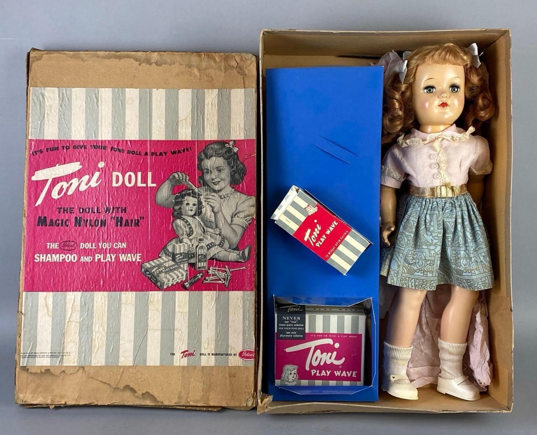 Vintage Ideal Toni P-92 Red Hair Doll with Non-Original Box and Reproduction Inserts: Non-original box and reproduction inserts, Green sleepy eyes, With Play Wave Kit, Loose joints, Right leg loose and neck loose, Some tears in box, Box measures 19 1/2 x 13 x 5 inches, Doll measures 19