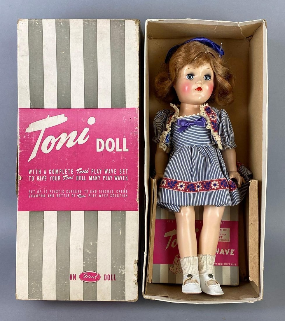 Vintage Ideal Toni P-90 Red Hair Doll with Original Box: Blue-Grey sleepy eyes, With Play Wave Kit, Some loose joints, Neck loose, Some tears in box, Box measures 15 1/4 x 6 3/4 x 3 3/4 inches, Doll measures 14 inches tall.