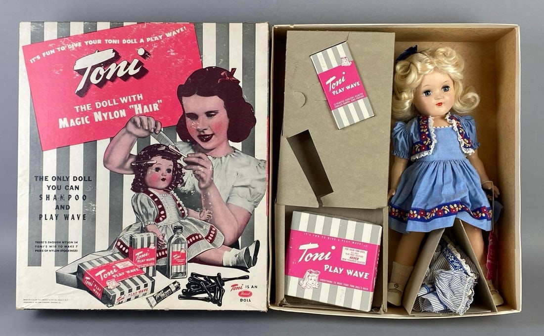 Vintage Ideal Toni P-91 Blonde Doll with Original Box: Blue-Grey sleepy eyes, With Play Wave Kit, With additional outfit, Some tears in box, Box measures 16 1/2 x 14 1/4 x 4 inches, Doll measures 16 inches tall.