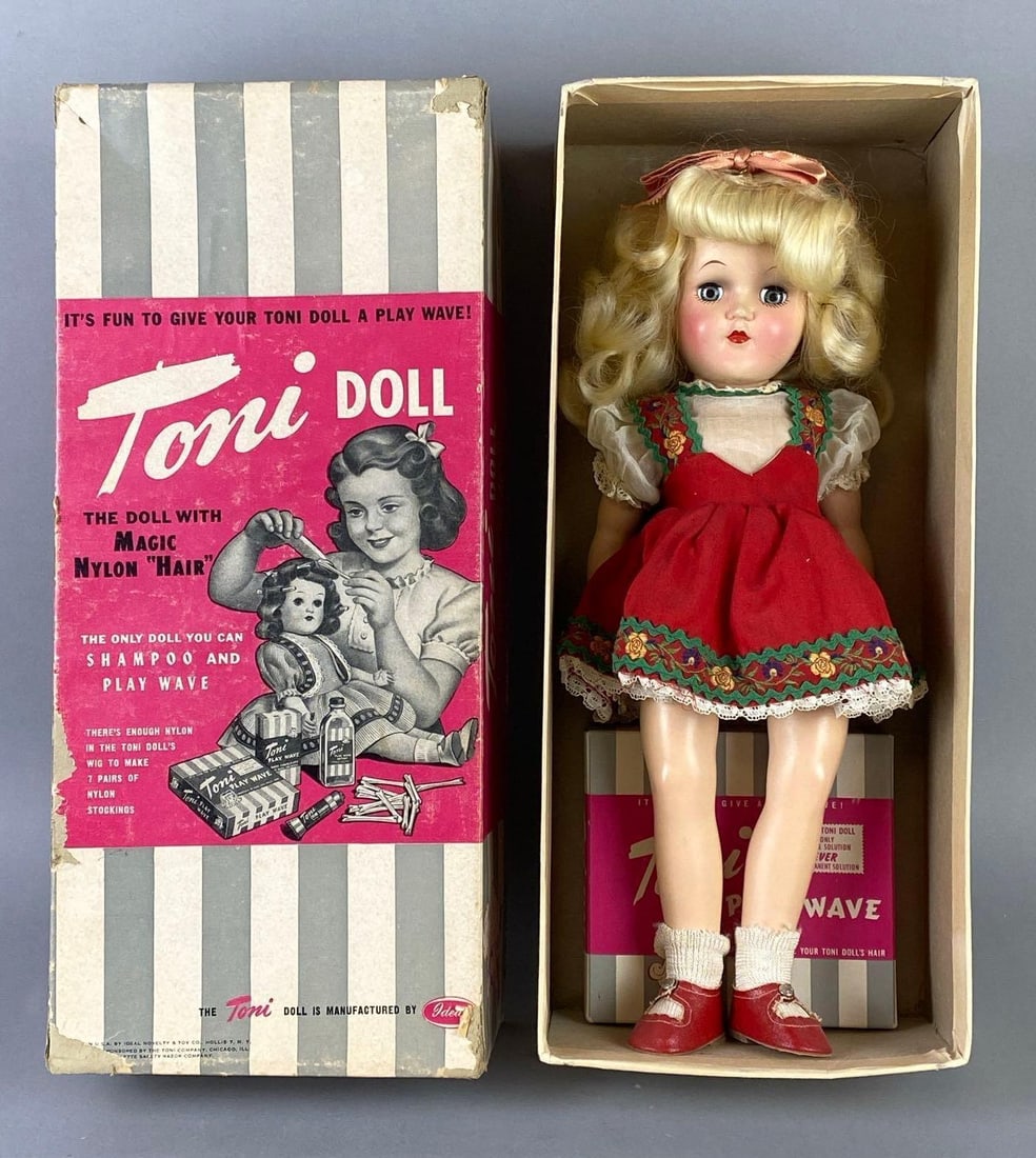 Vintage Ideal Toni P-90 Blonde Doll with Original Box: Blue-Grey sleepy eyes, With Play Wave Kit, Neck is loose, Some tears in box, Box taped, Box measures 15 1/2 x 6 3/4 x 4 inches, Doll measures 14 inches tall.