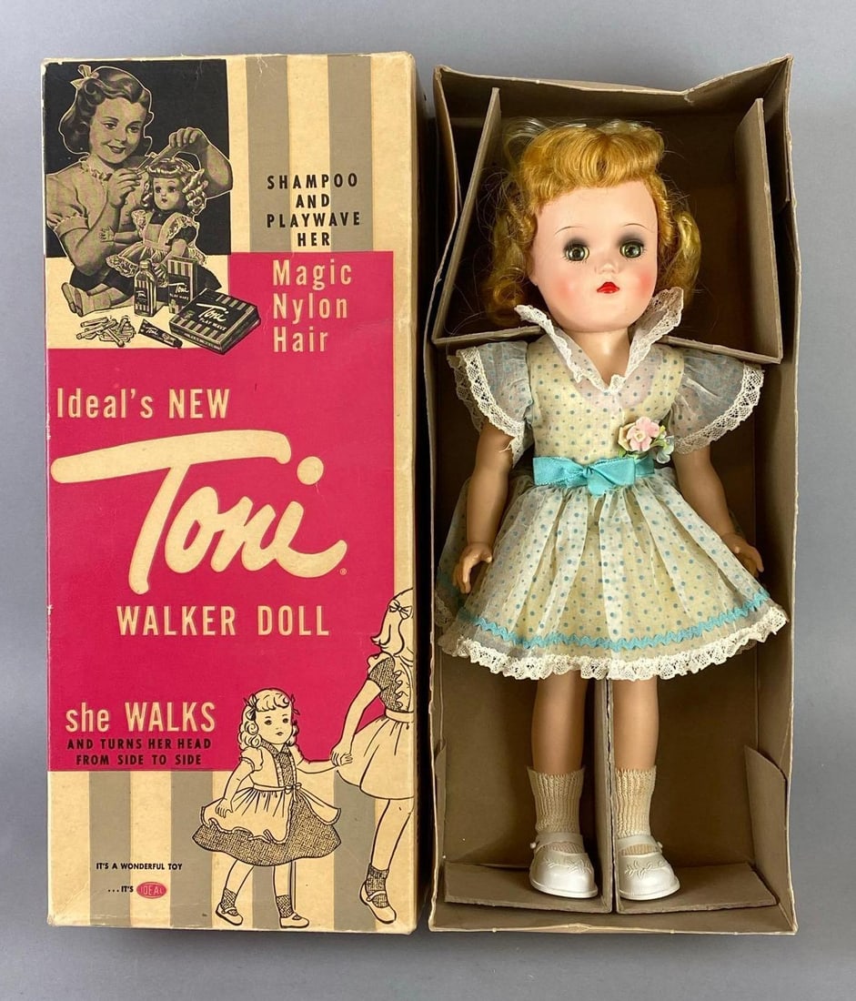 Vintage Ideal Toni P-90W Blonde Walker Doll with Original Box: Green sleepy eyes, Some tears in box, Box measures 15 1/2 x 6 3/4 x 4 inches, Doll measures 14 1/2 inches tall.